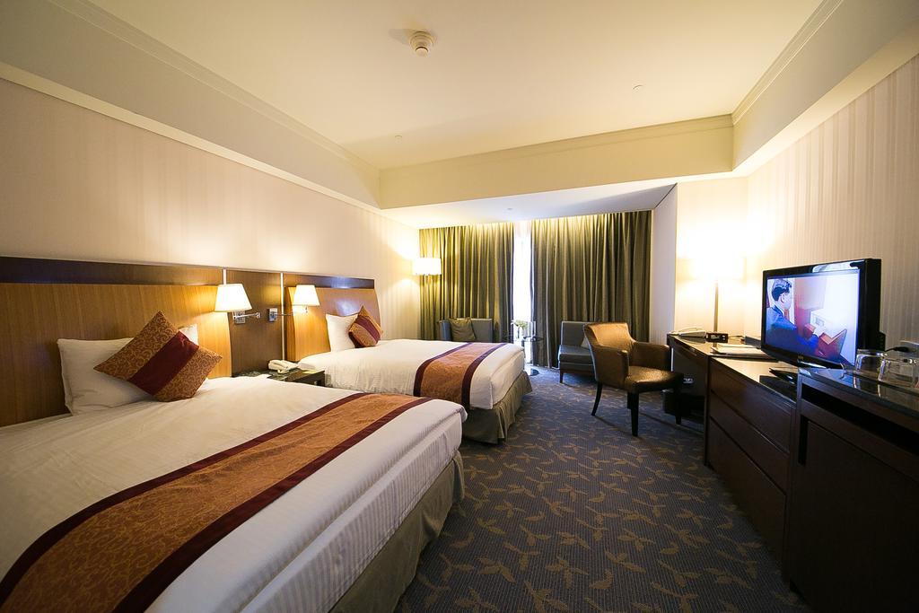 Evergreen Plaza Hotel - Тайнань Номер фото Deluxe Room