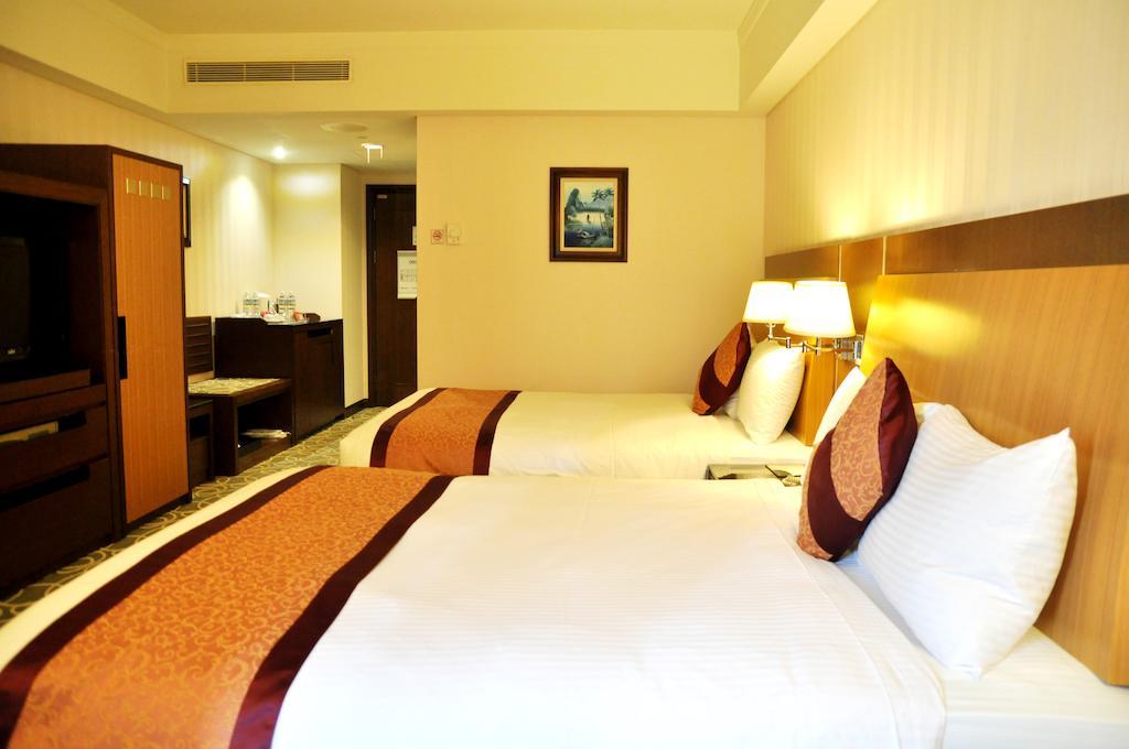 Evergreen Plaza Hotel - Тайнань Номер фото Deluxe Room
